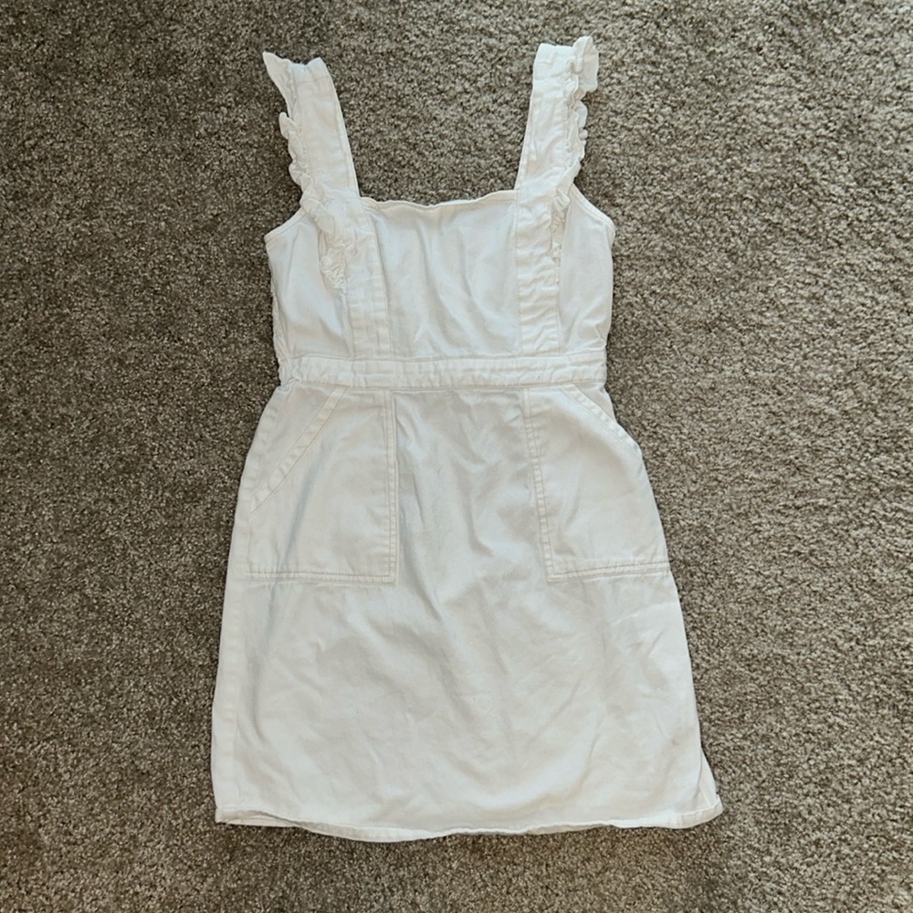 White cotton dress with ruffled sleeves